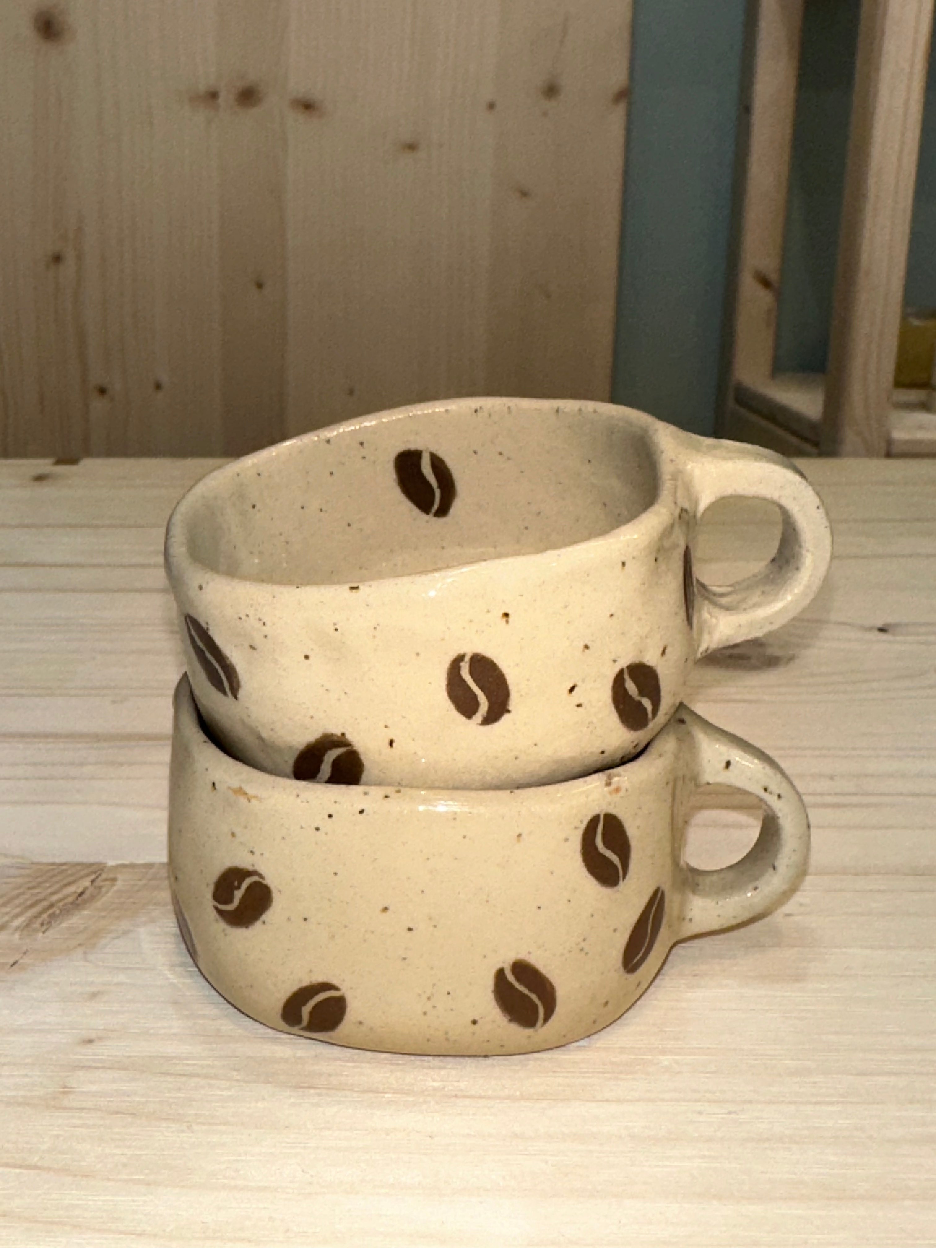 Espresso cup with coffe beans