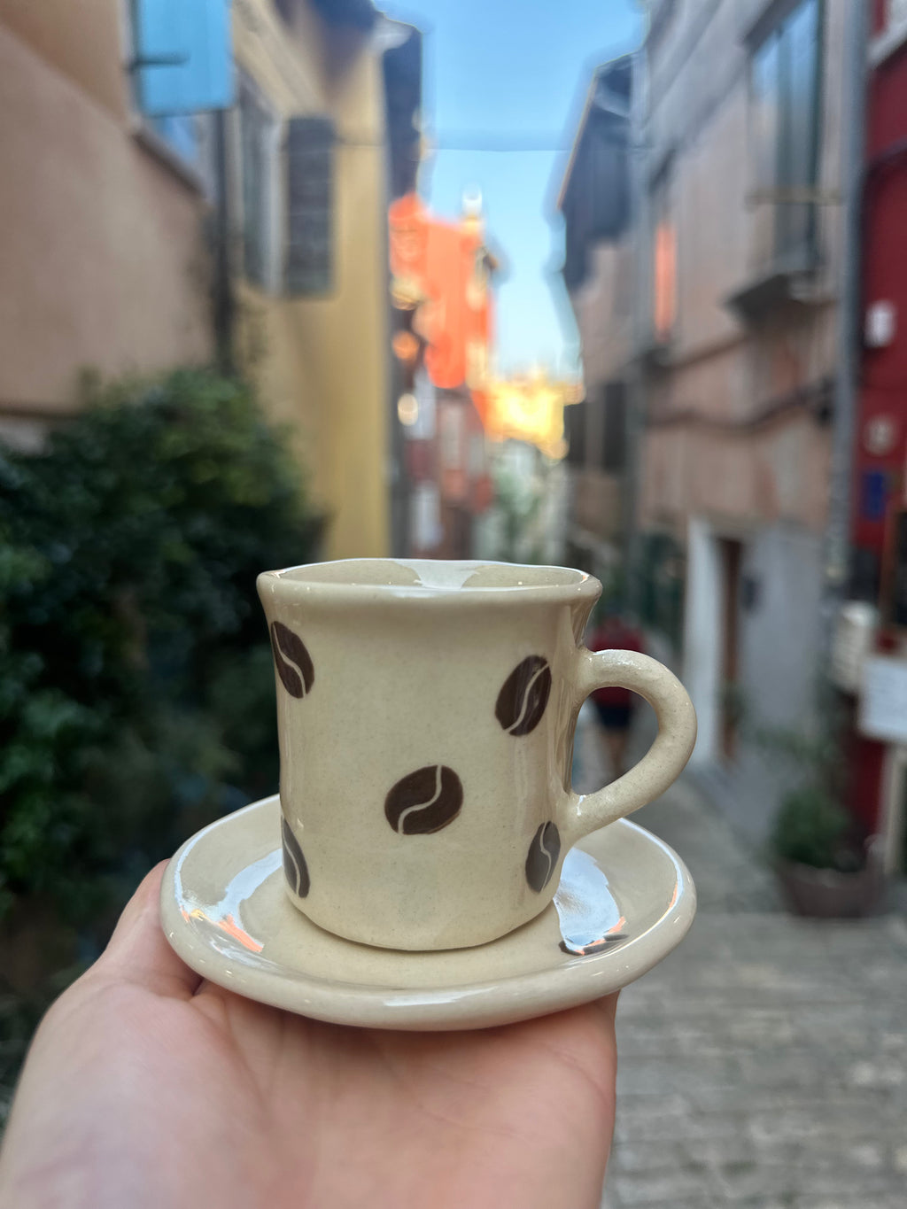 Espresso cup with coffee beans
