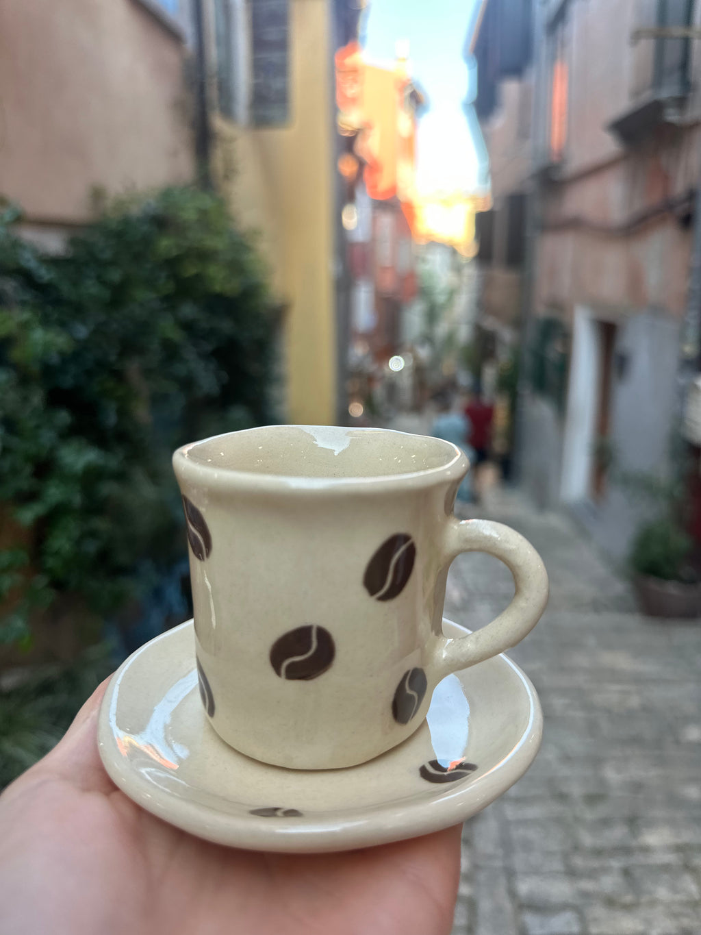 Espresso cup with coffee beans