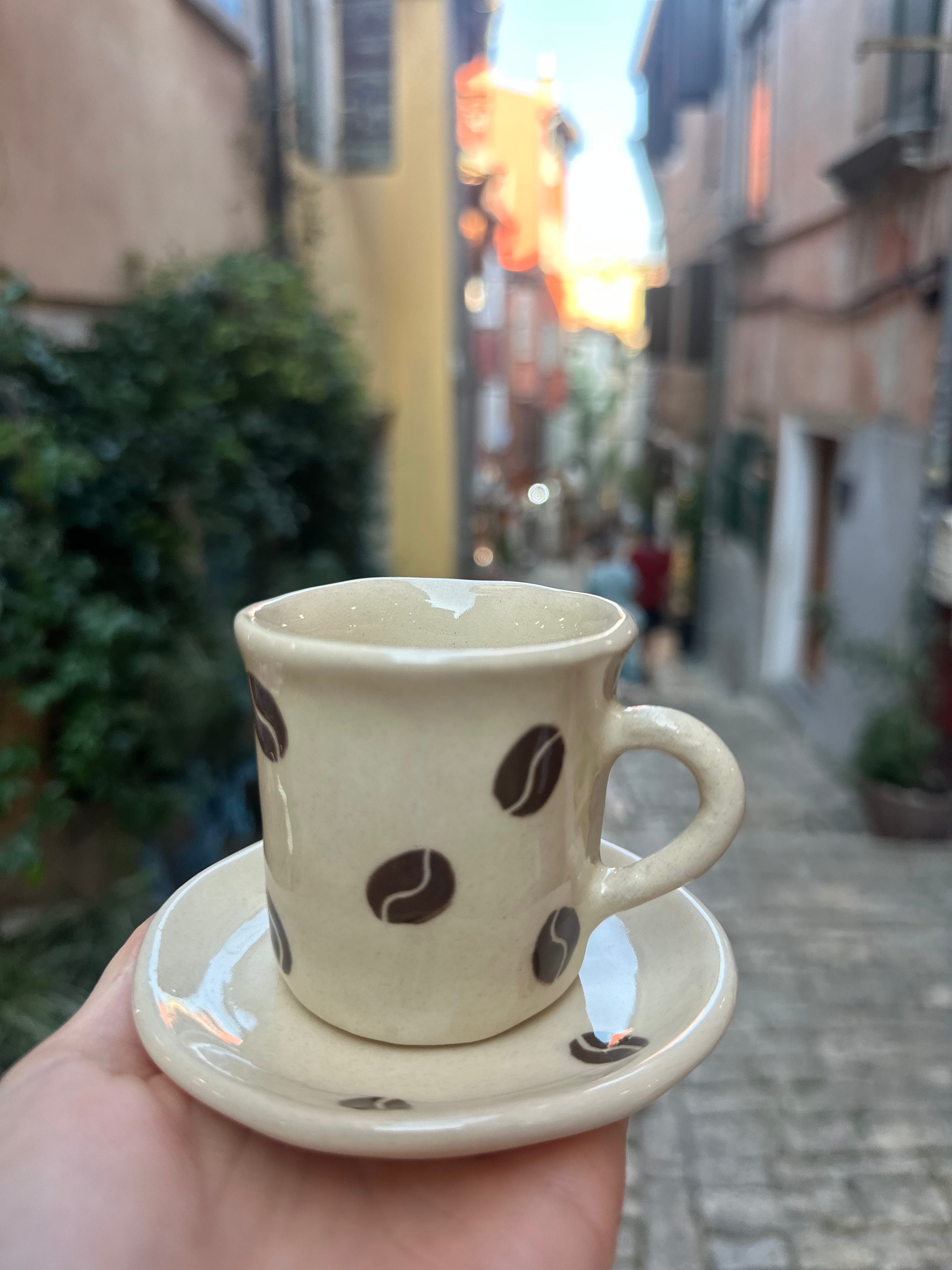 Espresso cup with coffee beans