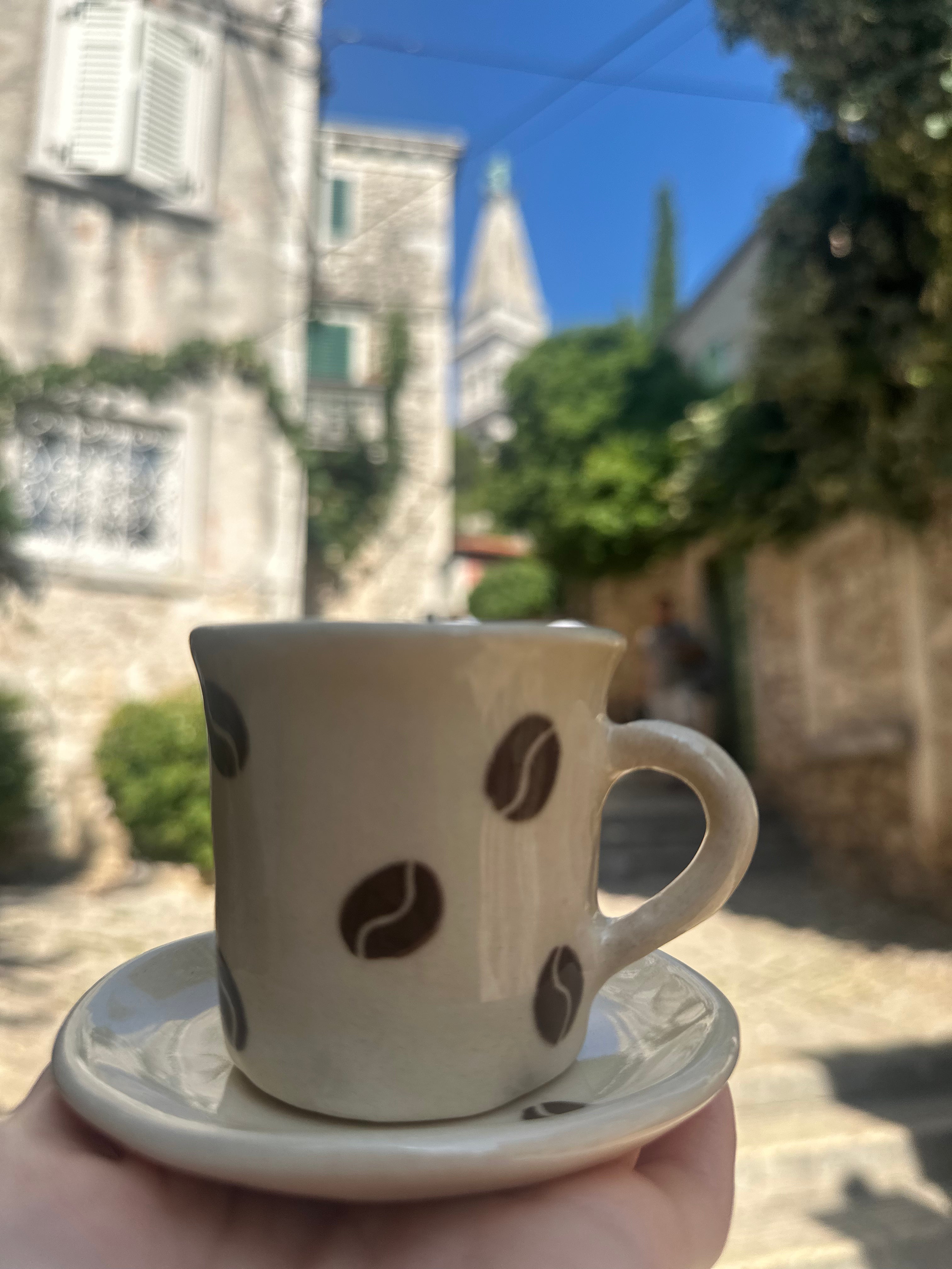 Espresso cup with coffee beans